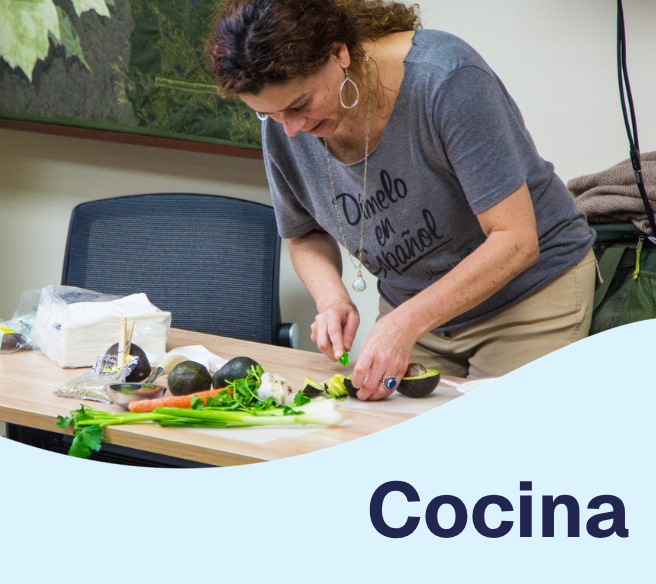 photo of a woman cutting vegetables