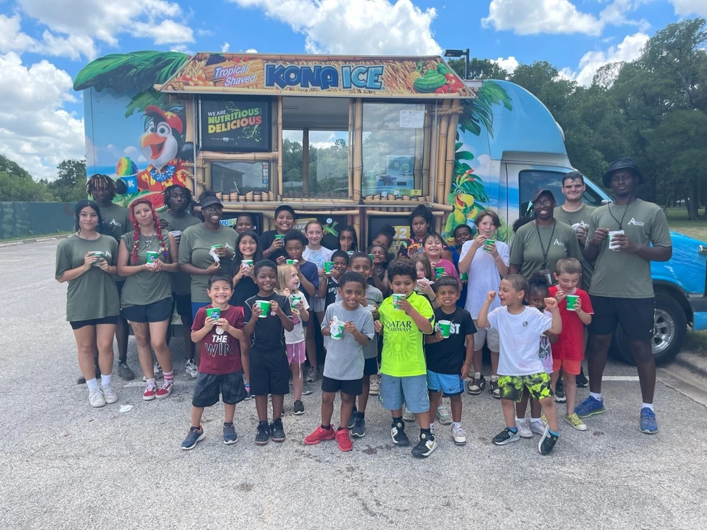 group of kids and staff with snow cones