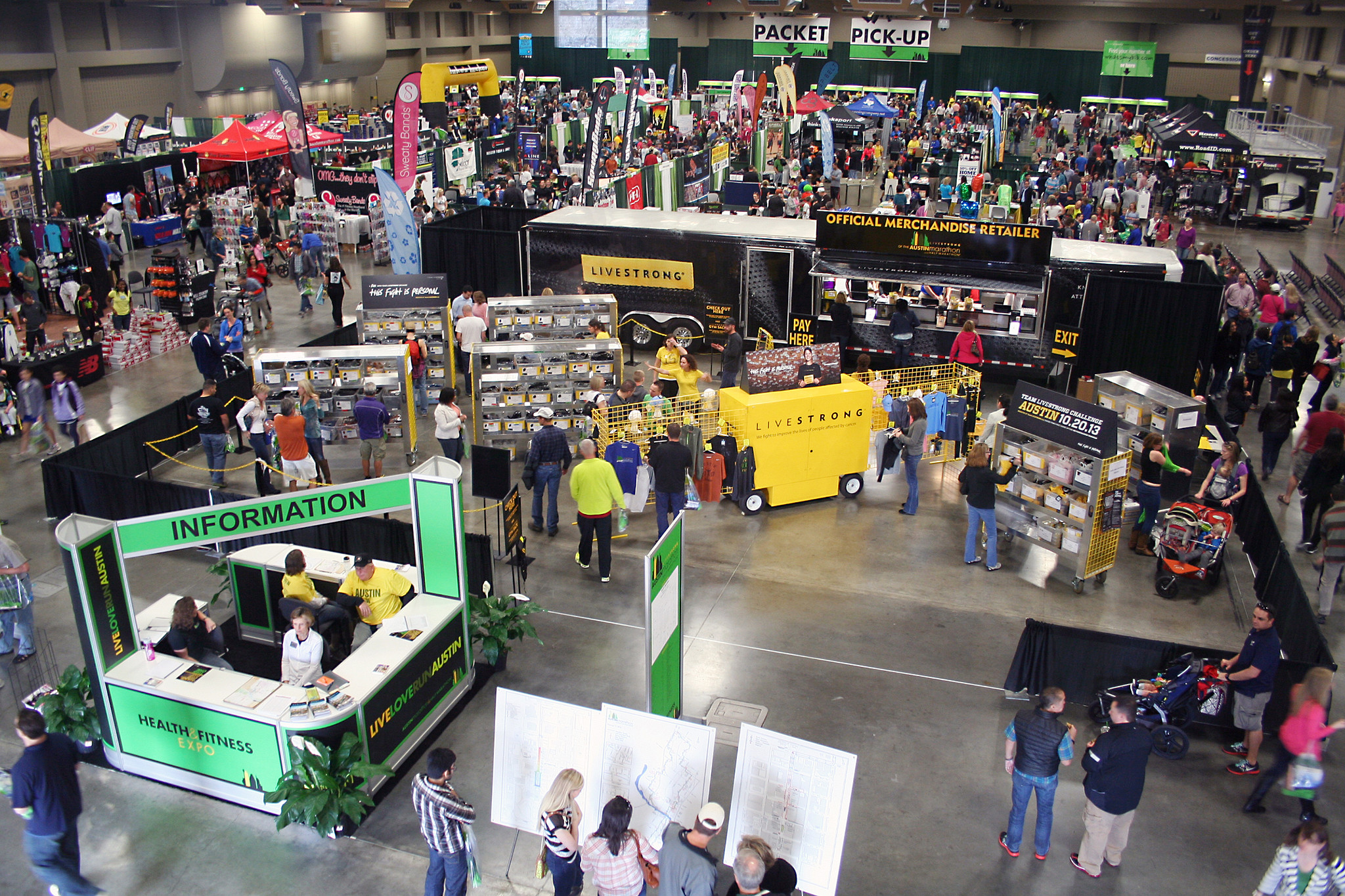 Image from above of a Palmer Events Center exhibit hall with an event in house showcasing exhibit ordering capabilities